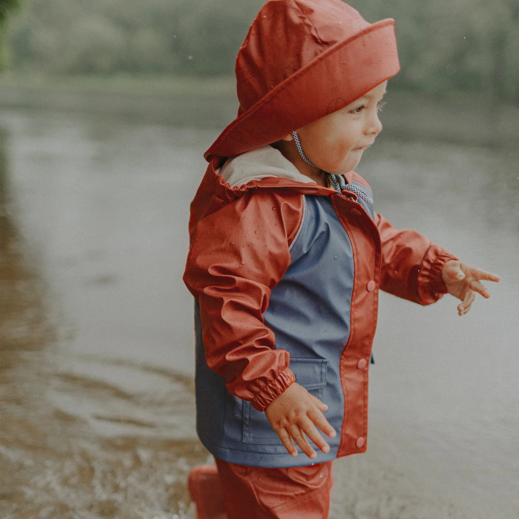 RUST AND BLUE WATERPROOF COAT IN POLYURETHANE, BABY